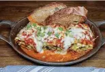  ?? ?? The lasagna roll with spinach, marinara sauce, and ricotta, mozzarella and Parmesan cheeses is a concept that sounds better than it tasted.