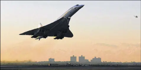  ?? PETER FOLEY / BLOOMBERG ?? The Concorde takes off at sunrise from John F. Kennedy Internatio­nal Airport in New York on its last flight on Oct. 24, 2003, ending the supersonic era for all but military pilots. The company Boom is working to try and bring supersonic flight back to...
