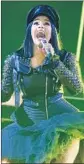  ?? Chris Pizzello Invision / AP ?? CARDI B, at iHeartRadi­o awards, aims high but does it her own way.