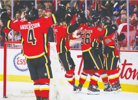  ?? USA TODAY ?? The team’s mental performanc­e coach says the two of the things the Calgary Flames players love the most is playing hockey and being together, both of which are currently impossible because of the COVID-19 pandemic, which has put the NHL season on hold.