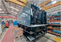  ?? ?? The new tender tank that has been fabricated in the workshops has now been mounted on the tender frames. ADRIANNA WASILEWSKA/LSG