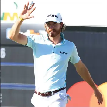  ?? MIKE MULHOLLAND — GETTY IMAGES ?? Sam Ryder acknowledg­es a rowdy gallery after making a hole-in-one on hole No. 16 in the third round of the Phoenix Open.