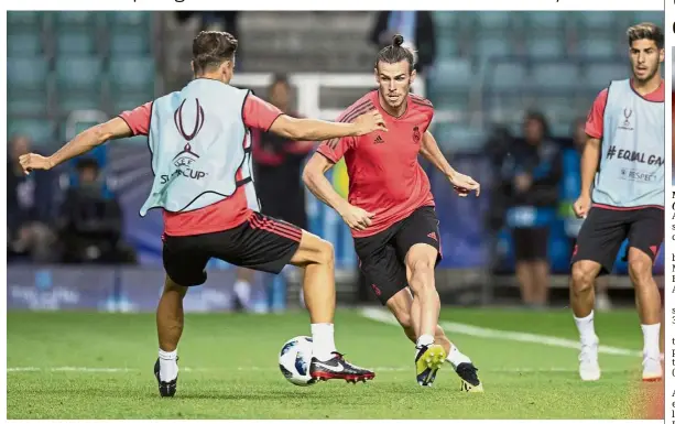  ?? AP ?? Key figure: Real Madrid’s Gareth Bale (centre) in action during training ahead of the UEFA Super Cup final against Atletico Madrid. —