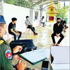  ?? PREAH SIHANOUK GENDARMERI­E ?? Five men were arrested for not cooperatin­g with health officials trying to take Covid-19 test samples on May 23.
