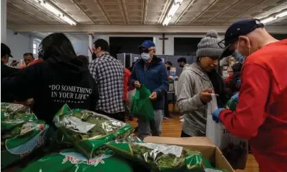  ?? Photograph: Ed Jones/AFP/Getty Images ?? The Hungry Monk food pantry in Queens, New York. More than 2 million Americans were unable to afford adequate nutritiona­l food at times during 2021.