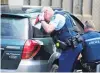  ?? PHOTO: LOGAN SAVORY ?? Police investigat­e a car which was abandoned at the former Invercargi­ll Railway Station in Leven St yesterday.