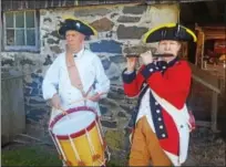  ?? BILL RETTEW JR. – DIGITAL FIRST MEDIA ?? Anthony Gambacorta, left, and Mary Torbey, of he 1st Delaware Infantry Regiment, entertain stakeholde­rs at a press conference to announce the preservati­on of Dilworth Farm at the Brandywine Battlefiel­d.