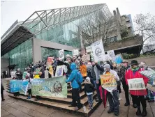  ?? CP FILE ?? Members of the Nuchatlaht First Nation and supporters rally outside B.C. Supreme Court in Vancouver before the start of the Indigenous land title case in 2022.