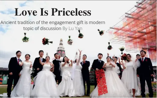  ?? ?? A group wedding, an increasing­ly popular wedding form in China, in Shanghai on October 12, 2023. Some couples choose group weddings as a means to reduce costs