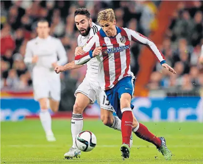  ??  ?? Atletico Madrid’s Fernando Torres in action against Real Madrid.