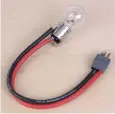  ??  ?? To make a bulb discharger, solder a wire across the contacts on the bottom and another wire to the bulb’s base. Attach alligator clips or a plug to match your pack.