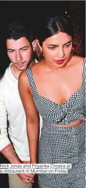  ?? Photos by AFP, AP and PTI ?? Nick Jonas and Priyanka Chopra at a restaurant in Mumbai on Friday.