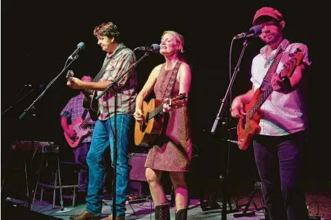  ?? Courtesy photo ?? Husband-and-wife duo Bruce Robison and Kelly Willis and their band perform at the 2019 Zazu fundraisin­g concert for Camp Aranzazu.