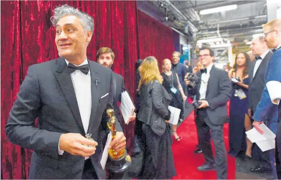  ?? Photo / Getty Images ?? Taika Waititi won for his Jojo Rabbit screenplay but the best picture Oscar went to Korean director Bong Joon-ho’s Parasite.