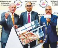  ?? Courtesy: DDF ?? Vipul, Colm McLoughlin and Ramesh Cidambi at the special Diwali draw of DDF Millennium Millionair­e.