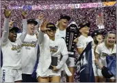  ?? DAVID BECKER – THE ASSOCIATED PRESS ?? California Baptist players celebrate their victory over Stephen F. Austin in the WAC Tournament title game.