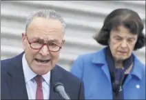  ?? YURI GRIPAS — ABACA PRESS — TNS ?? Senate Minority Leader Chuck Schumer and Senate Judiciary Committee Democrats speak to themedia in Washington on October 22after boycotting the Judiciary Committee meeting on the nomination of Judge Amy Coney Barrett to be an associate justice of the U.S. Supreme.