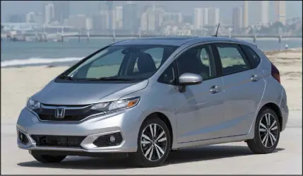  ?? HONDA ?? The Honda Fit subcompact gets a refresh for the 2018 model year with a new look at both the front and rear, several new safety features and some cabin updates.