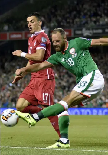  ?? Photo: Mick Harpur. ?? David Meyler of the Republic of Ireland battles for possession with Filip Kostic of Serbia during last week’s World Cup Qualifier in the Aviva Stadium.