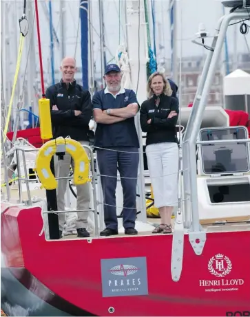  ?? PAUL HANKEY PHOTO ?? Praxes Medical CEO Susan Helliwell and her husband, Dr. John Ross, left, with Sir Robin Knox-Johnston, founder of the Clipper Round the World Yacht Race. Praxes is providing telemedici­ne care to sailors taking part in the race.