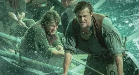  ?? JONATHAN PRIME/THE ASSOCIATED PRESS ?? Chris Hemsworth, right, as Owen Chase, and Sam Keeley as Ramsdell in a scene from the film In the Heart of the Sea, which opens Friday.