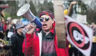  ?? DARRYL DYCK/THE CANADIAN PRESS/FILES ?? Despite daily protests against the Trans Mountain pipeline expansion, more people in every region of the country, including Quebec and Ontario, back the project than oppose it.