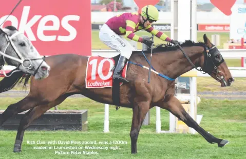  ?? ?? Rich Clan, with David Pires aboard, wins a 1200m maiden in Launceston on Wednesday night. Picture Peter Staples.