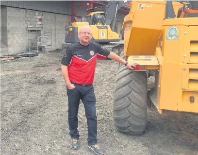  ??  ?? Stanley club owner Andy Holt overseeing ground improvemen­t work at the Wham Stadium