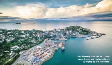  ??  ?? Port Moresby from the air … new shops, hotels and restaurant­s are springing up at a rapid rate.