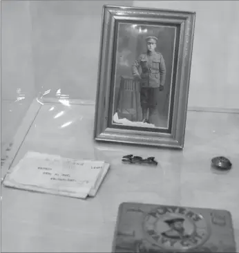  ?? Photos by Matthew Liebenberg ?? The exhibition includes a display of items that belonged to Private Andrew Hay, who enlisted with the 209th Battalion in Swift Current in 1916.