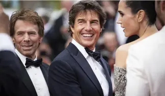  ?? ?? Tom Cruise poses for photograph­ers upon arrival at the premiere of the film 'Top Gun: Maverick' at the 75th internatio­nal film festival, Cannes, southern France, Wednesday, Ma