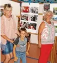  ?? Foto: Brigitta Ortmann ?? Eine Fotoausste­llung beleuchtet­e zum Dorf und Pfarrfest die Geschichte des Kindergart­ens.