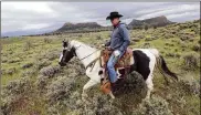  ?? THE DESERET NEWS 2017 ?? Interior Secretary Ryan Zinke rides a horse in the new Bears Ears National Monument near Blanding, Utah. Much of Bears Ears is on land administer­ed by the Bureau of Land Management.