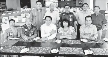  ??  ?? Ting (seated second right) and organising committee members pose for a group photo after the press conference.