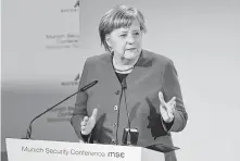  ?? Kerstin Joensson / Associated Press ?? German Chancellor Angela Merkel expressed “shock” Saturday at the claim that European autos threaten U.S. security.
