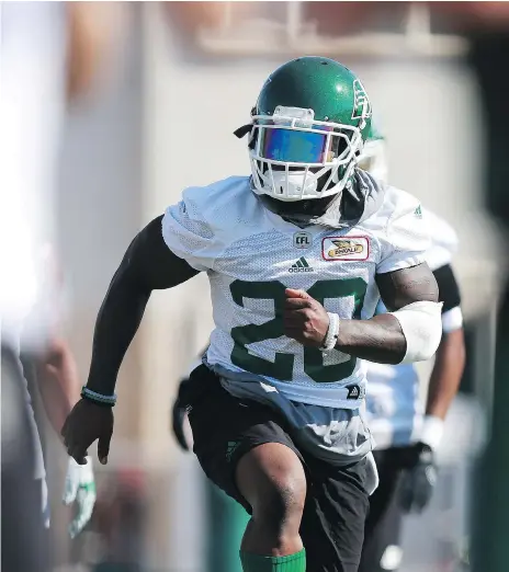  ?? MICHELLE BERG ?? Saskatchew­an Roughrider­s running back Zac Stacy runs drills during week two of Rider Training Camp at Griffiths Stadium in Saskatoon on Tuesday. Stacy returned to football after a broken ankle cut his NFL career short in 2015.