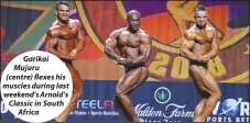  ??  ?? Garikai Mujuru (centre) flexes his muscles during last weekend’s Arnold’s Classic in South Africa