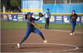  ?? OSUNA PHOTO ?? Brawley Union High's Aubrey Ruelas pitches during their home game against Calexico High on Thursday evening in Brawley. VINCENT