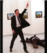  ??  ?? In this Monday, Dec 19, 2016 file photo Mevlut Mert Altintas shouts after shooting Andrei Karlov, right, the Russian ambassador to Turkey, at an art gallery in Ankara, Turkey. — AP photos