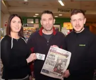  ??  ?? Anthony O’Hara from Gorey receives his €20 from Donna Murphy of People Newspapers and William Osborne of Osborne’s Daybreak, Gorey.