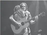  ??  ?? Kyle Riabko with performs with Laura Dreyfuss.