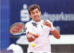  ?? ALEXANDER HASSENSTEI­N/GETTY IMAGES ?? Cristian Garin of Chile plays a fore hand during his 3rd-round match against Alexander Zverev of Germany on day 7 of the BMW Open at MTTC IPHITOS on April 19 in Munich, Germany.