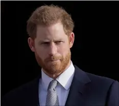  ?? AP Photo/Kirsty Wiggleswor­th ?? In this 2020 file photo, Britain’s Prince Harry arrives in the gardens of Buckingham Palace in London.