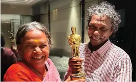  ?? Photograph: Kartiki Gonsalves ?? Bellie and Bomman, who tend to elephants on a nature reserve in Tamil Nadu, became a sensation after the documentar­y won an Oscar.