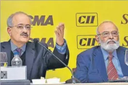  ?? PTI ?? Chairman of CII Trade Fairs Council, Vipin Sondhi (left) and SIAM president Abhay Firodia (right) at a press conference in New Delhi on Tuesday.