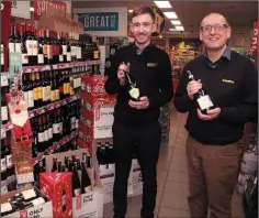  ??  ?? O’CALLAGHAN’S CENTRA: Off licence manager, Edward Murphy with the proprietor, Albert O’Callaghan.