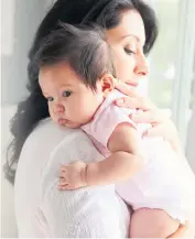  ??  ?? Bonding: Happy mother with her baby