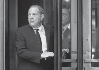  ?? SHANNON STAPLETON/REUTERS ?? Film producer Harvey Weinstein leaves New York Supreme Court after his arraignmen­t in his sexual assault case in New York, Monday.