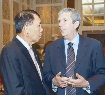  ??  ?? Ambassador­s Johny Lumintang of Indonesia and Roland Van Remoortele of Belgium.