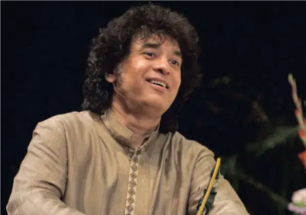  ??  ?? WORLD RENOWNED: Zakir Hussain credits his father for his success.